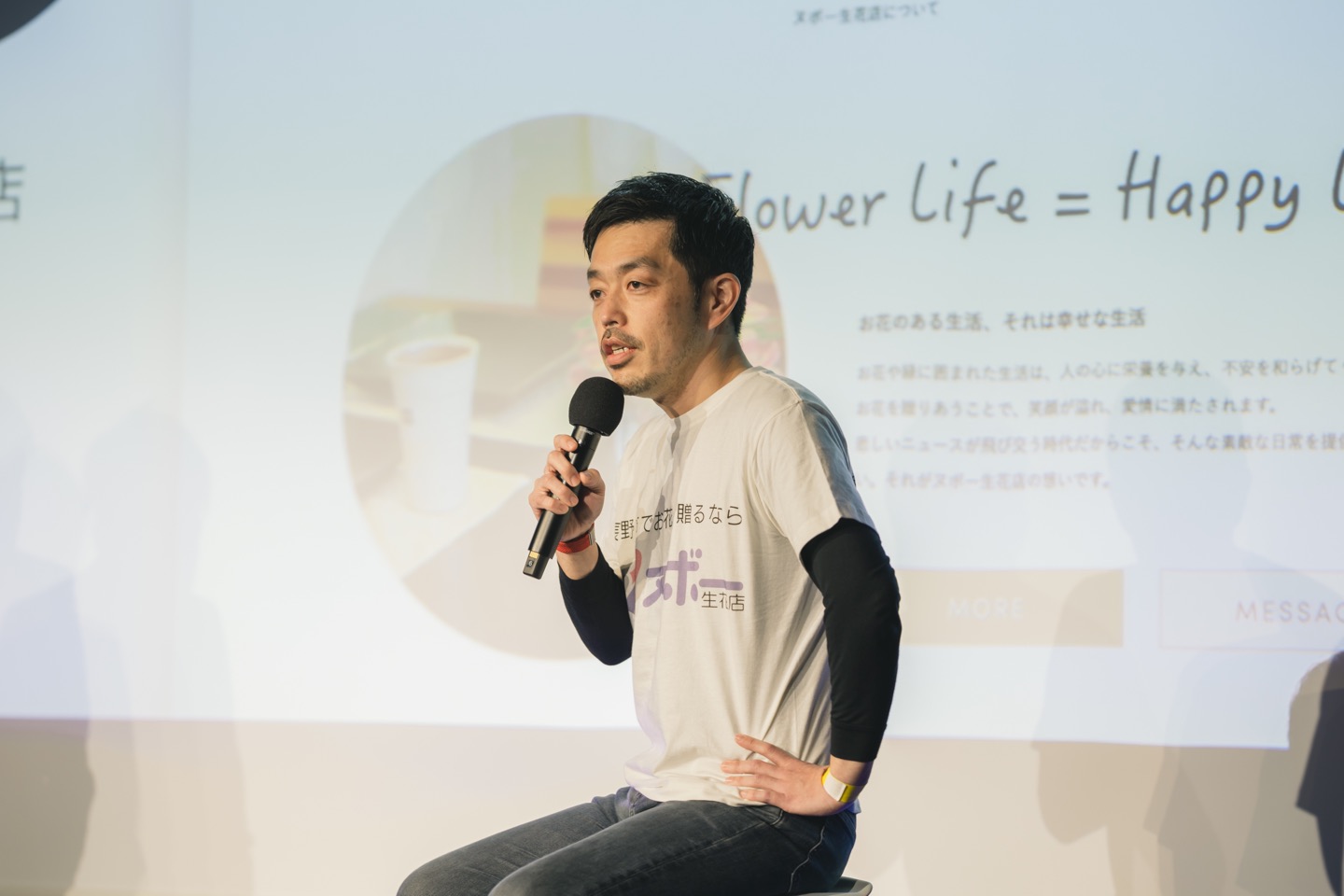 講演を行う山﨑社長